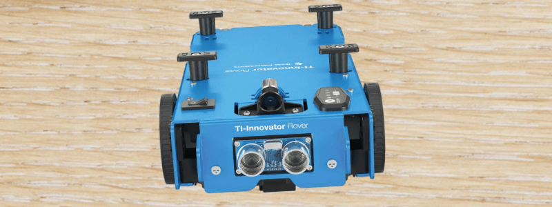 Blue TI-Innovator Rover STEM robotics device on a wooden surface for classroom activities