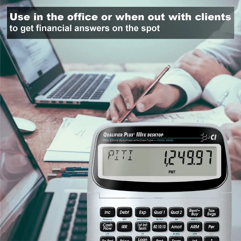 Qualifier Plus IIIfx calculator for real estate on office desk, Underwood Distributing Co.