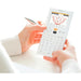 Person using NumWorks graphing calculator, displaying graph, from Underwood Distributing Co.