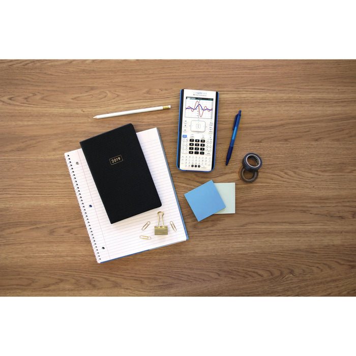 TI-Nspire CX II graphing calculator on wood desk with notebook, planner, and office supplies