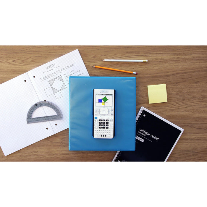 TI-Nspire CX II graphing calculator on blue binder with math supplies and notebooks